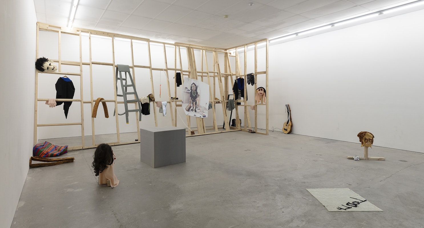 Ardi Gunawan, luckily there’s no inside (brick Muppet filth face anxiety ladder. Emotion traffic re-enactment Jakarta body) 2011/2025, installation view, Of Stadiums and Construction Sites (Ne change rien pour que tout soit différent), Gertrude Contemporary, Naarm Melbourne, 2025, performance, synthetic fur, foam, fabric, cardboard, found objects, digital print mounted on kappa board, timber structures repurposed from previous exhibition build, image courtesy the artist as ISA Gallery, Jakarta © the artist, photograph: Christian Capurro