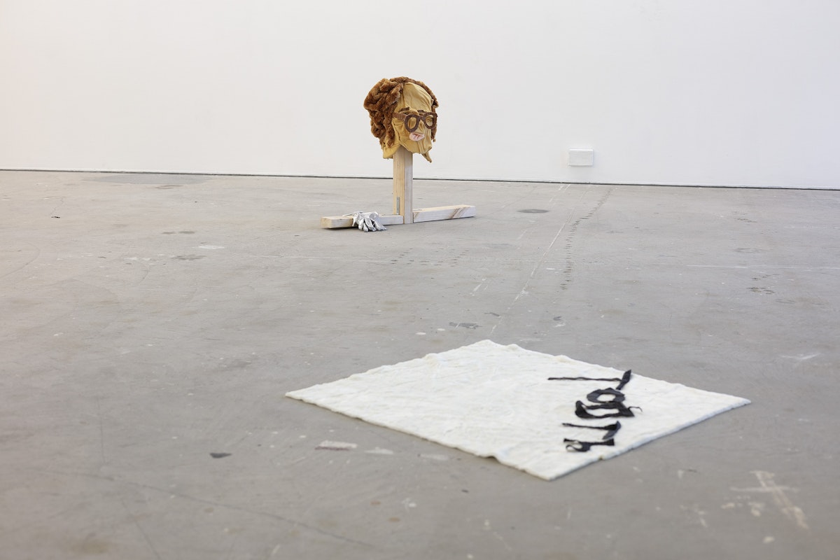 Ardi Gunawan, luckily there’s no inside (brick Muppet filth face anxiety ladder. Emotion traffic re-enactment Jakarta body) 2011/2025, installation view, Of Stadiums and Construction Sites (Ne change rien pour que tout soit différent), Gertrude Contemporary, Naarm Melbourne, 2025, performance, synthetic fur, foam, fabric, cardboard, found objects, digital print mounted on kappa board, timber structures repurposed from previous exhibition build, image courtesy the artist as ISA Gallery, Jakarta © the artist, photograph: Christian Capurro