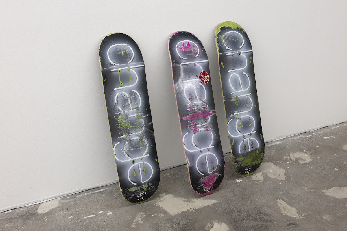 The Estate of Blair Trethowan, Hoddle Skateboards PTY LTD, Caeylen Norris, Jim Roche, Jordan Halsall and Matthew Ware, Change deck, 2005/2025, installation view, Of Stadiums and Construction Sites (Ne change rien pour que tout soit différent), Gertrude Contemporary, Naarm Melbourne, 2025, plywood, heat transfer, image courtesy and © the artists, photograph: Christian Capurro