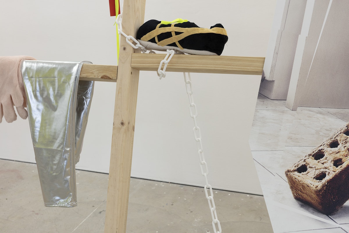 Ardi Gunawan, luckily there’s no inside (brick Muppet filth face anxiety ladder. Emotion traffic re-enactment Jakarta body) 2011/2025, installation view, Of Stadiums and Construction Sites (Ne change rien pour que tout soit différent), Gertrude Contemporary, Naarm Melbourne, 2025, performance, synthetic fur, foam, fabric, cardboard, found objects, digital print mounted on kappa board, timber structures repurposed from previous exhibition build, image courtesy the artist as ISA Gallery, Jakarta © the artist, photograph: Christian Capurro