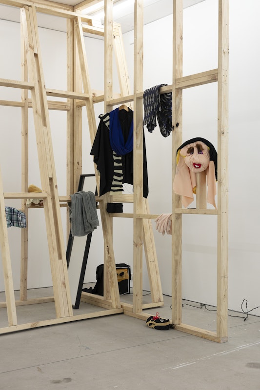 Ardi Gunawan, luckily there’s no inside (brick Muppet filth face anxiety ladder. Emotion traffic re-enactment Jakarta body) 2011/2025, installation view, Of Stadiums and Construction Sites (Ne change rien pour que tout soit différent), Gertrude Contemporary, Naarm Melbourne, 2025, performance, synthetic fur, foam, fabric, cardboard, found objects, digital print mounted on kappa board, timber structures repurposed from previous exhibition build, image courtesy the artist as ISA Gallery, Jakarta © the artist, photograph: Christian Capurro