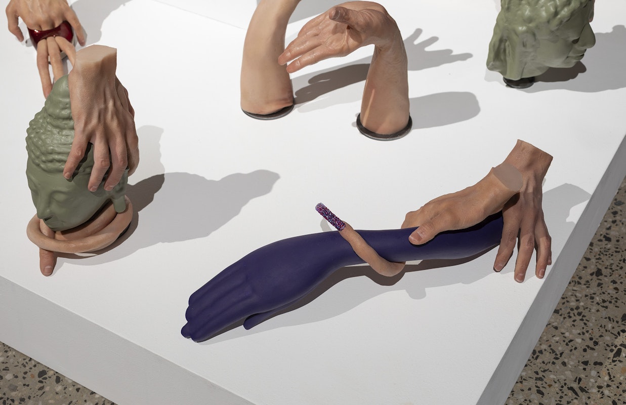 Nathan Beard, Cicerone (detail), 2025, installation view, Cicerone, Gertrude Glasshouse, Naarm Melbourne, 2025, painted silicone, steel, foam, 3D printed polylactic acid, 3D printed resin, alleged Ayutthaya period bronze, Gucci ‘Siam Glitter’ platform sandals, Siam Shimmer Swarovski Elements, Light Siam AB Swarovski Elements, Resene ‘Siam’, Little Greene ‘Thai Sapphire’, plastic orchid, acrylic nails, image courtesy the artist and FUTURES, Naarm Melbourne © the artist, photograph: Christian Capurro