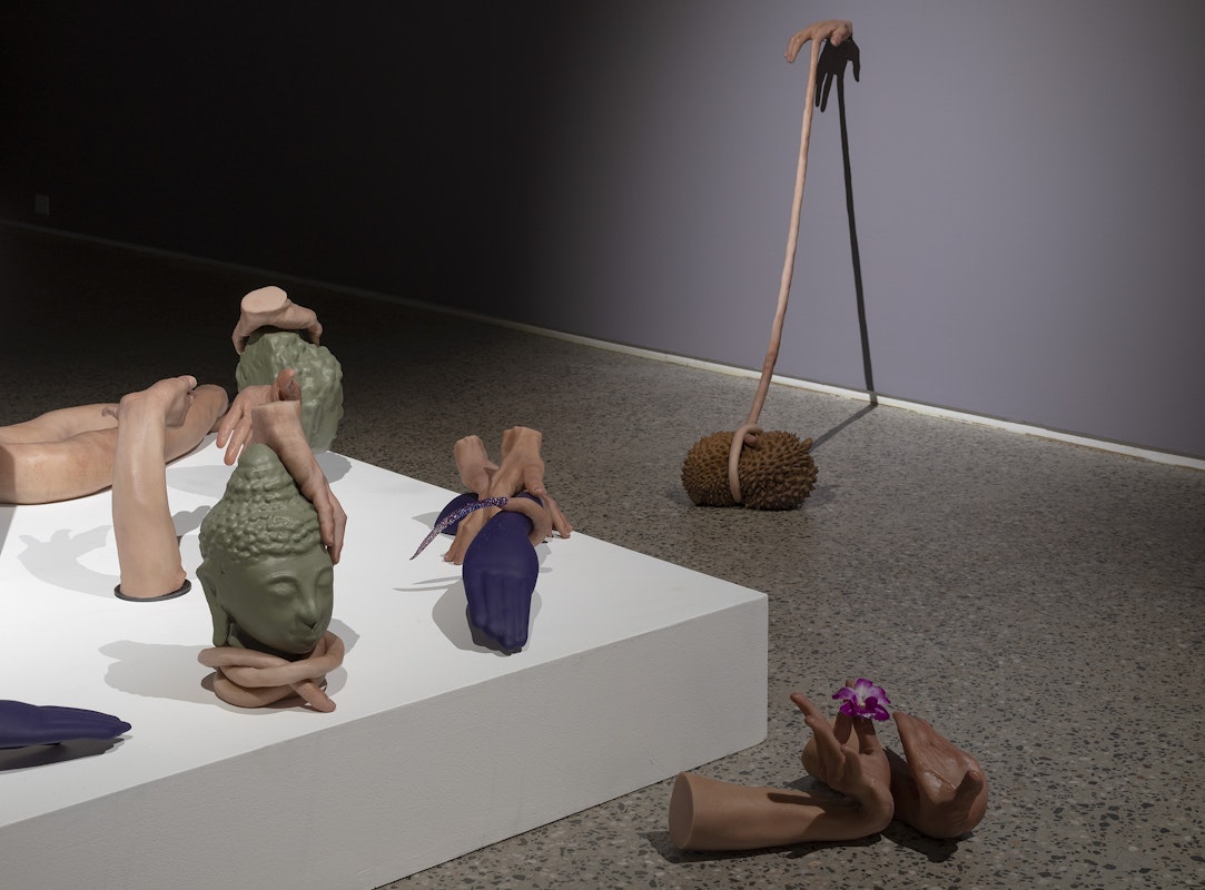 Nathan Beard, Cicerone (detail), 2025, installation view, Cicerone, Gertrude Glasshouse, Naarm Melbourne, 2025, painted silicone, steel, foam, 3D printed polylactic acid, 3D printed resin, alleged Ayutthaya period bronze, Gucci ‘Siam Glitter’ platform sandals, Siam Shimmer Swarovski Elements, Light Siam AB Swarovski Elements, Resene ‘Siam’, Little Greene ‘Thai Sapphire’, plastic orchid, acrylic nails, image courtesy the artist and FUTURES, Naarm Melbourne © the artist, photograph: Christian Capurro