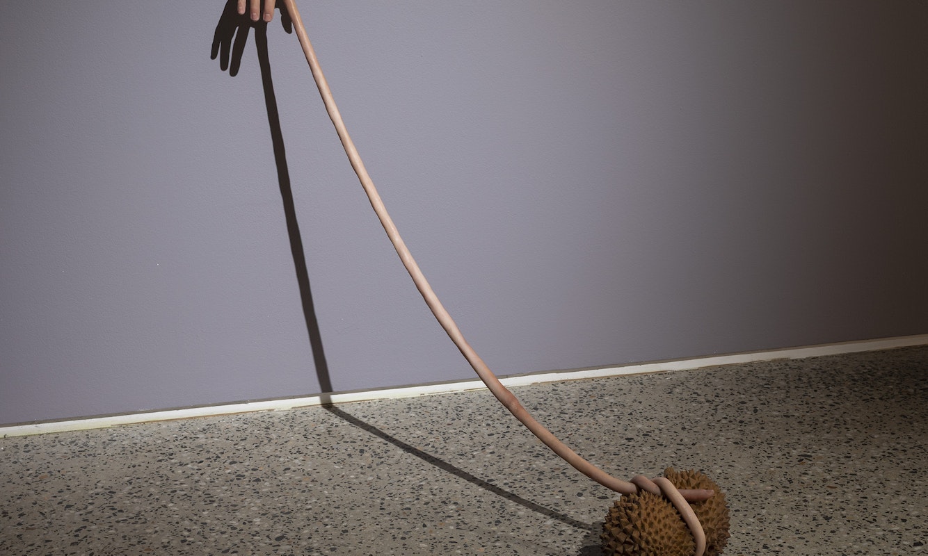 Nathan Beard, Cicerone (detail), 2025, installation view, Cicerone, Gertrude Glasshouse, Naarm Melbourne, 2025, painted silicone, steel, foam, 3D printed polylactic acid, 3D printed resin, alleged Ayutthaya period bronze, Gucci ‘Siam Glitter’ platform sandals, Siam Shimmer Swarovski Elements, Light Siam AB Swarovski Elements, Resene ‘Siam’, Little Greene ‘Thai Sapphire’, plastic orchid, acrylic nails, image courtesy the artist and FUTURES, Naarm Melbourne © the artist, photograph: Christian Capurro