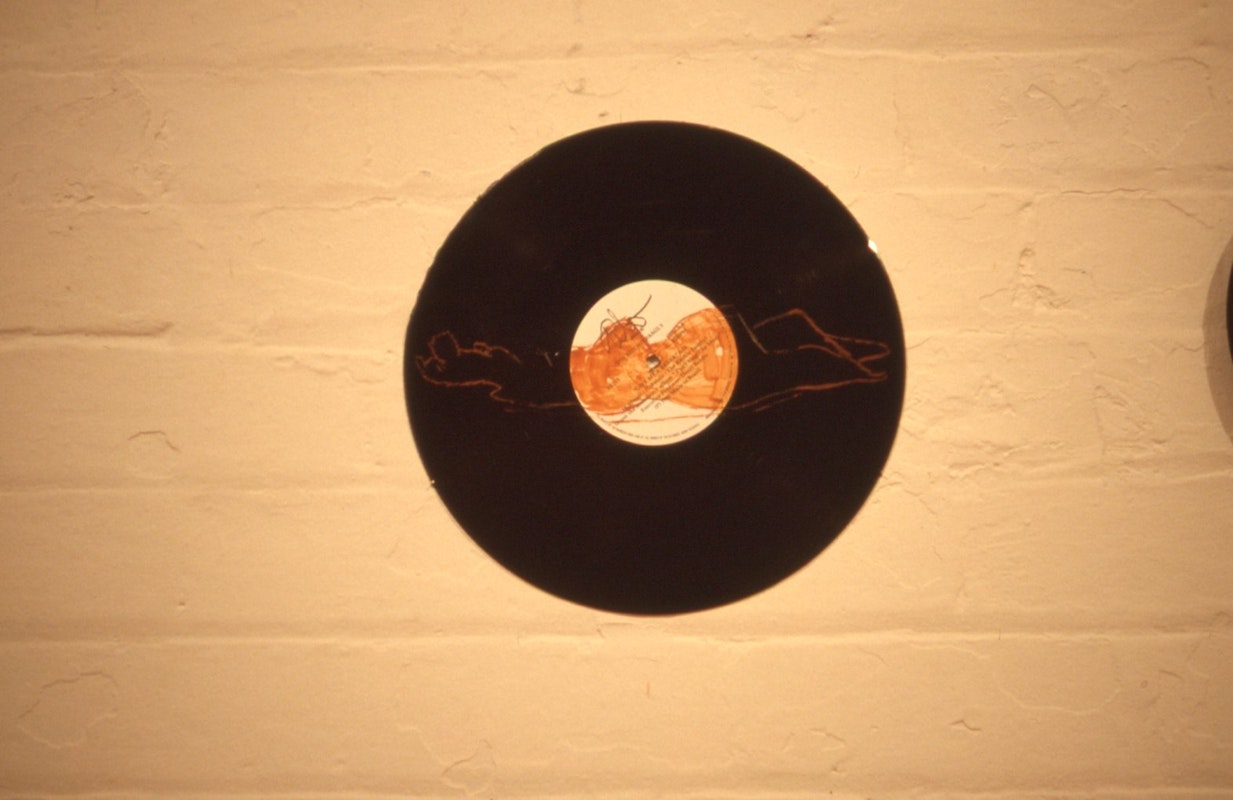 Geoff Lowe, Jon Campbell, and Kevin Murray, Asia - 5 Records (detail, Record 1), 1989, art materials on records, No.2 shellac, 30cm diameter. Image courtesy of Gertrude Archive.