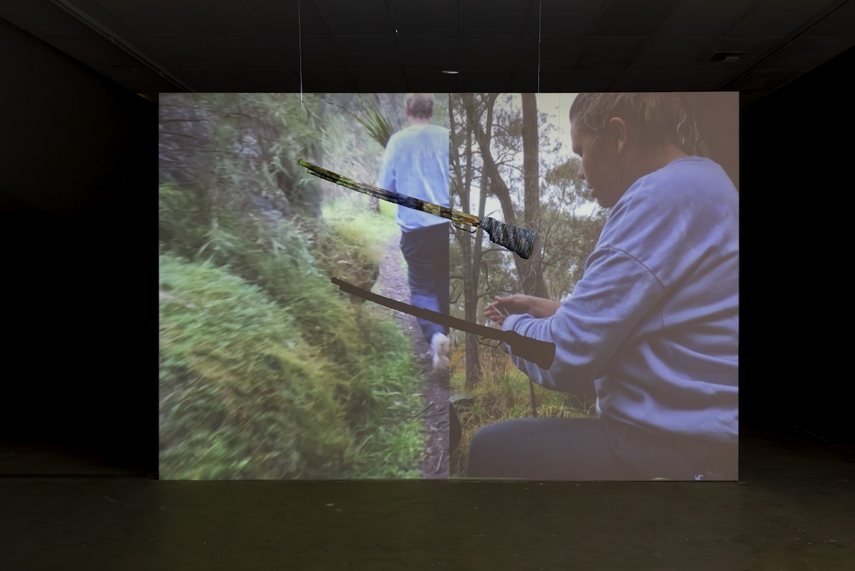 Gabi Briggs, GEDYURA, 2024, installation view, Various Small Fires, Gertrude Contemporary, Naarm Melbourne, 2025, lomandra, wood, wire, single-channel video, colour, silent, image courtesy and © the artist, photograph: Christian Capurro