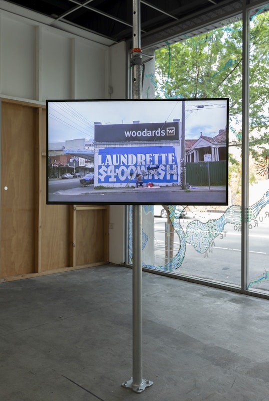 Georgia Morgan, Here to Clean Up (High Street), 2024, installation view, Various Small Fires, Gertrude Contemporary, Naarm Melbourne, 2025, single-channel video, colour, sound, image courtesy of the artist and Neon Parc, Naarm Melbourne © the artist, photograph: Christian Capurro
