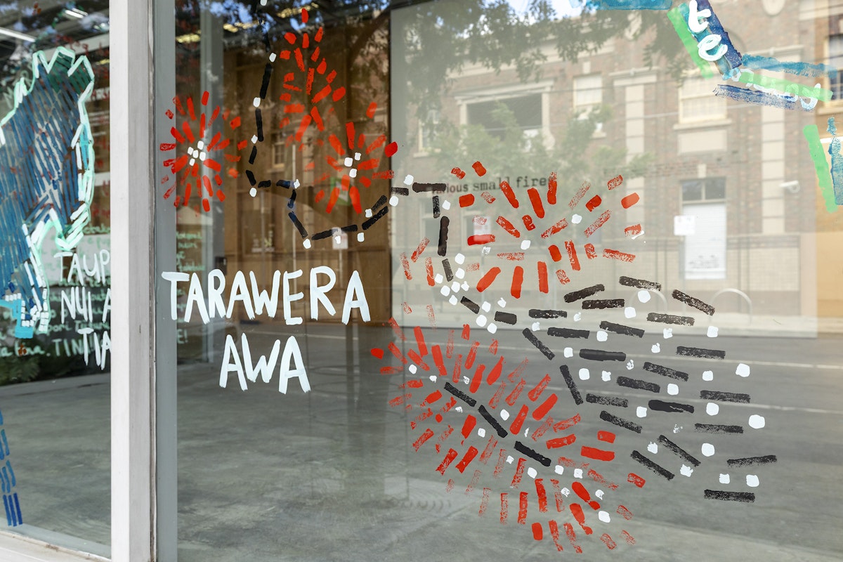 Renee Cosgrave in collaboration with Akuira, Amorangi, Jasmine Morrish, Rachel Boyd, Angela Cooper-Naresh, Anahera Neho-Cooper, Waru Cooper, Christo Crocker, Lisa Manawa Grocott, Helena Hapeta, Bronwyn Kara, Julien Te Purei Comer-Kleine, Errol MacKinven Hunt, Heneriata Paringatai, Watere Tahi, Irihipeti Waretini and our Kirrip (Bun Wurrung Balug), Ngā awa whina o te whakapapa (The braided rivers of whakapapa), 2025, installation view, Various Small Fires, Gertrude Contemporary, Naarm Melbourne, 2025, acrylic and chalk on window, image courtesy and © the artists, photograph: Christian Capurro