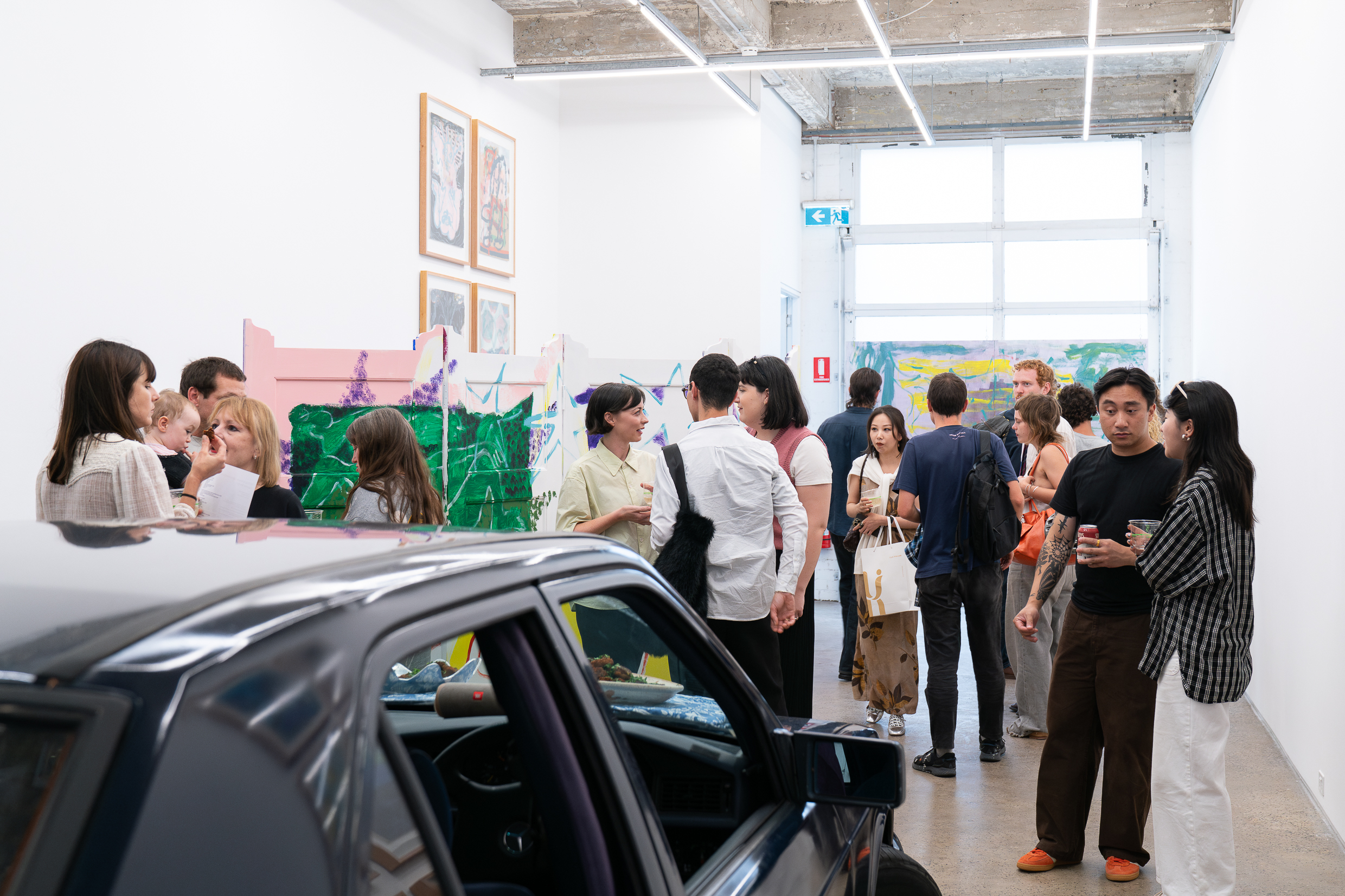 Audiences attend the opening event of Georgia Morgan's exhibition 'Nothing's forever cause everything is' at Gertrude Glasshouse, Naarm Melbourne, 2025. Photo: Machiko Abe.