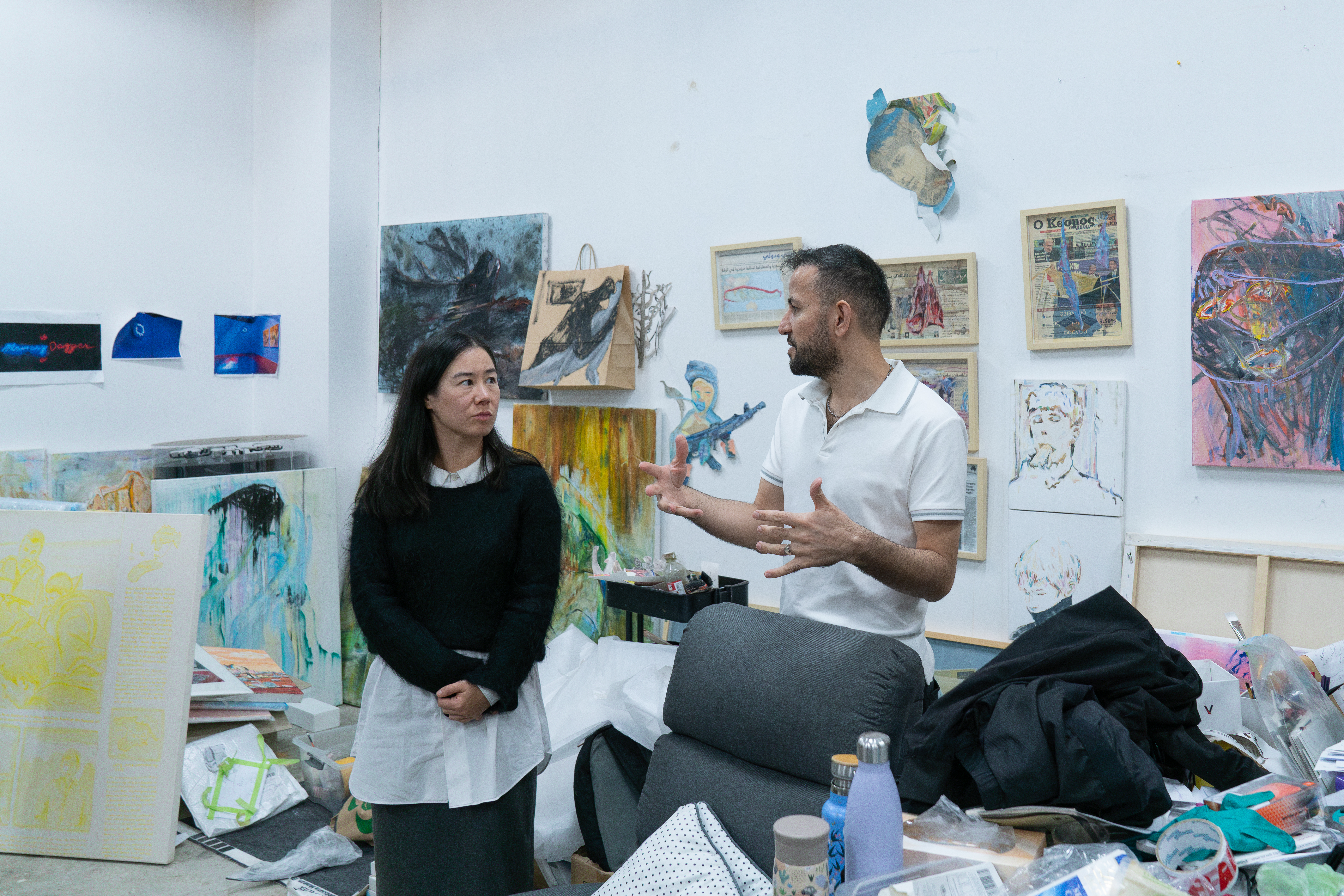Curator Amelia Winata in conversation with Gertrude Studio Artist Elyas Alavi, pictured in the artists' studio at Gertrude Contemporary, Naarm Melbourne, 2024. Photo: Machiko Abe