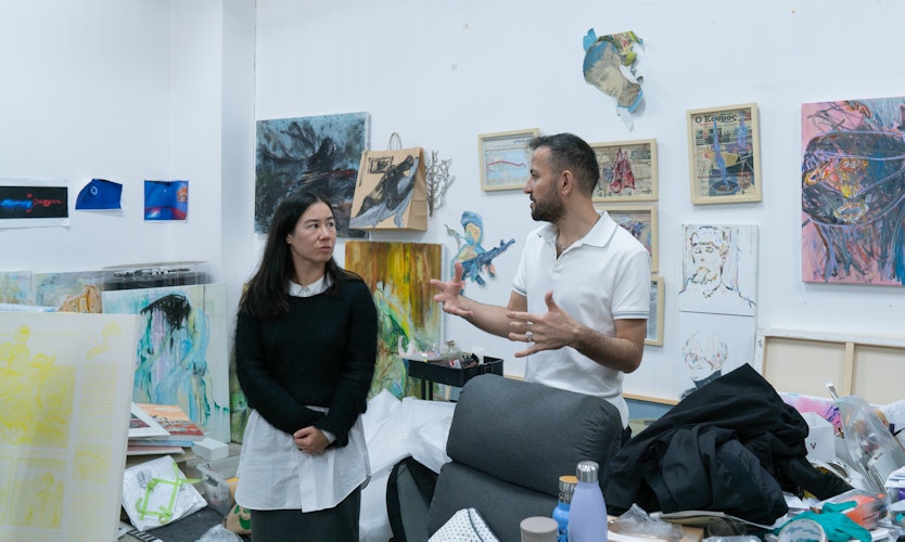 Curator Amelia Winata in conversation with Gertrude Studio Artist Elyas Alavi, pictured in the artists' studio at Gertrude Contemporary, Naarm Melbourne, 2024. Photo: Machiko Abe