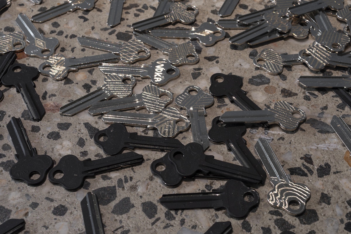 Moorina Bonini, We Were Never Meant to be Contained, hand engraved keys, sound 5:36 mins, installation view, We Were Never Meant to be Contained, Gertrude Glasshouse, Naarm Melbourne, 2026, image courtesy and © the artist, photograph: Christian Capurro