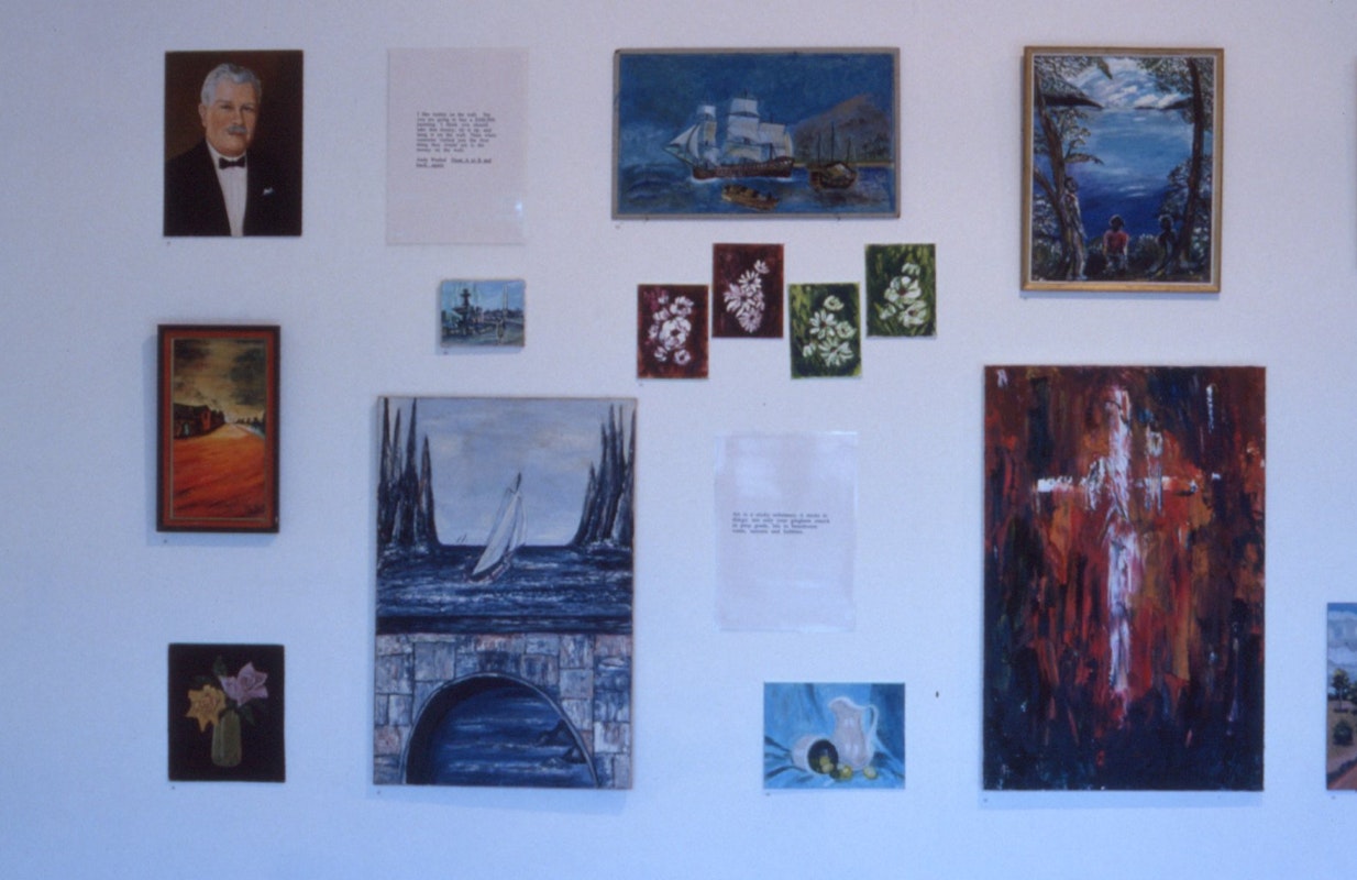 Installation view of Opp Art: Anonymous Paintings in Opportunity Shops, curated by Stuart Koop and May Lam, 1989. Image Courtesy of Getrude Archives.