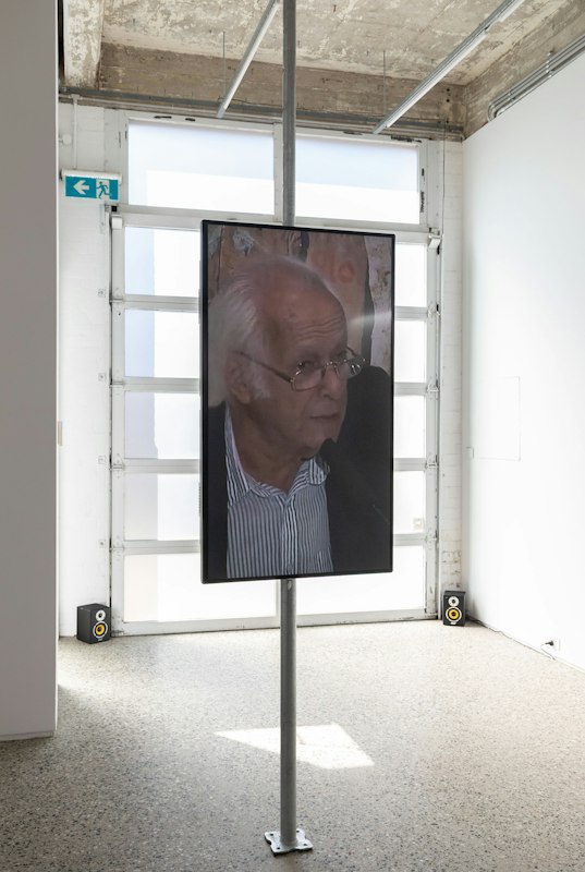 Tarik Ahlip, 9 Minutes with Samir Amin, 2026, single-channel video, colour, sound, 09:00 mins, looped, Feast of the Compradors,  Gertrude Glasshouse, Naarm Melbourne, 2026, image courtesy and © the artist, photograph: Christian Capurro.