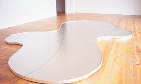 Lyndal Jefferies, Amorphous Pool, 1996, aluminium powder on oil on water. Photo courtesy of Gertrude Archive