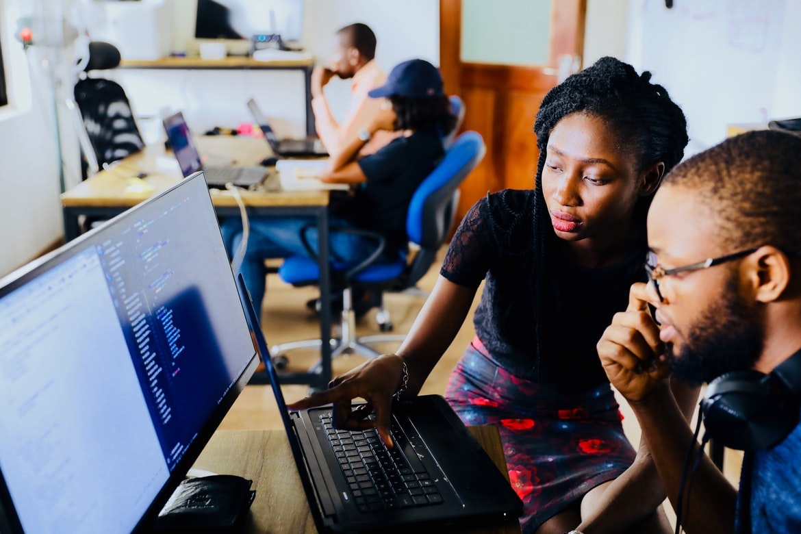 Two students coding