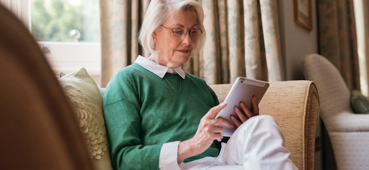 Lady looking at an iPad