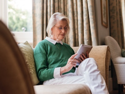 Lady looking at an iPad