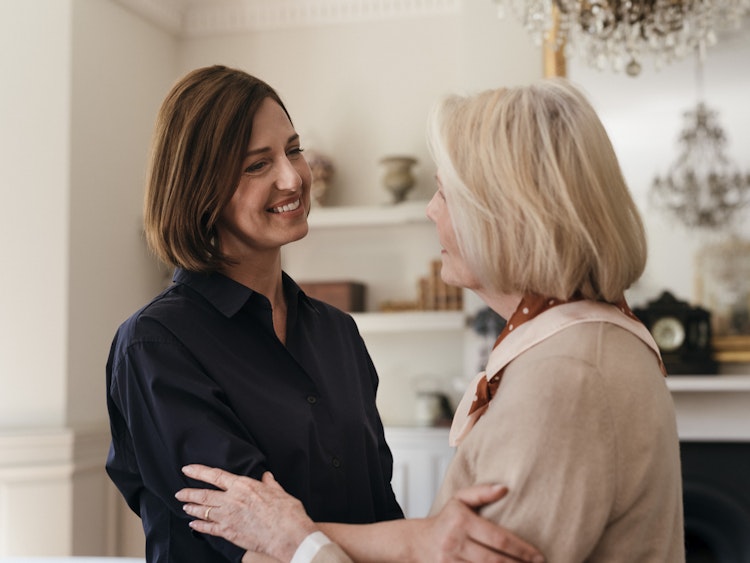 Draycott carer greeting Auriens resident