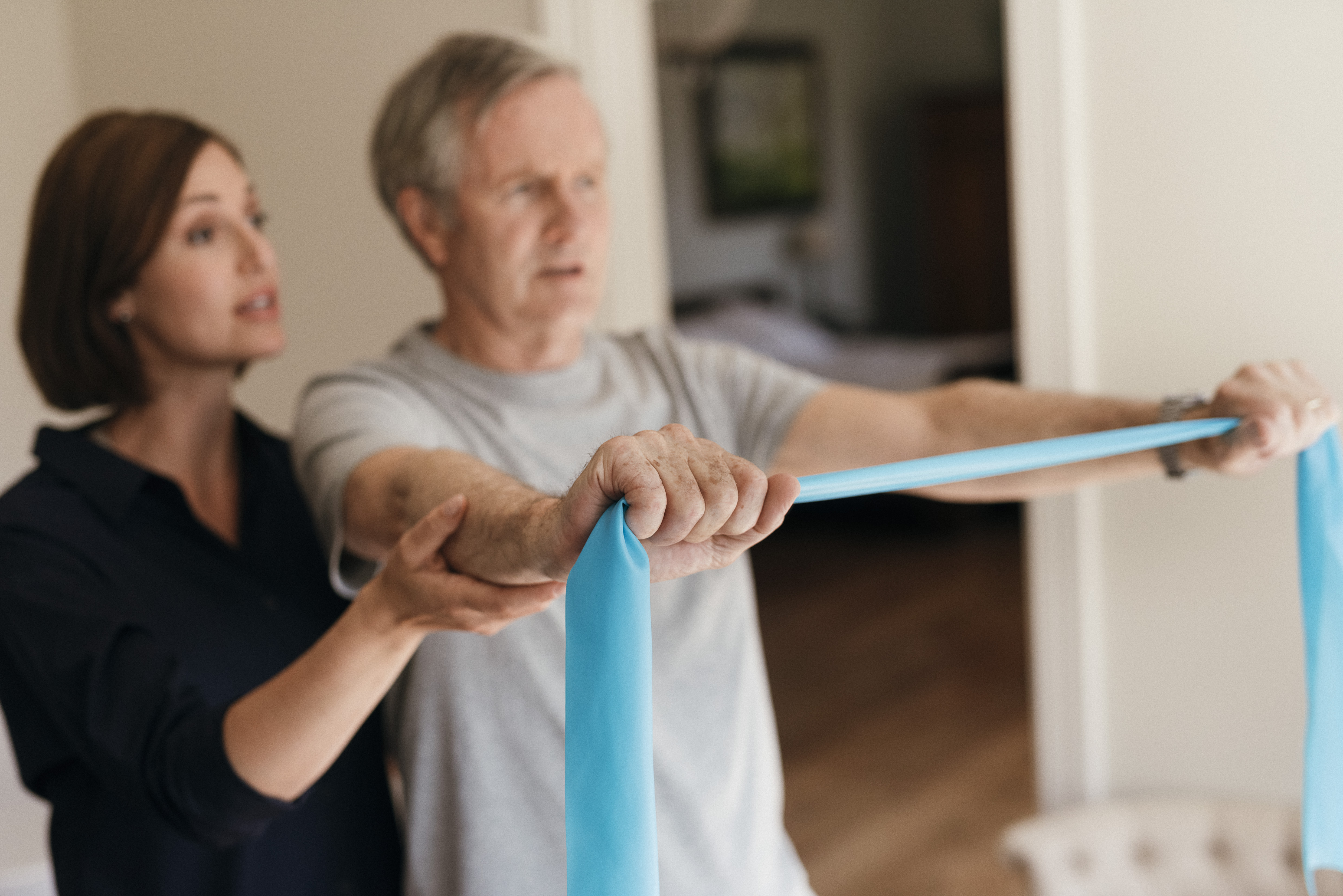 Physiotherapist with client