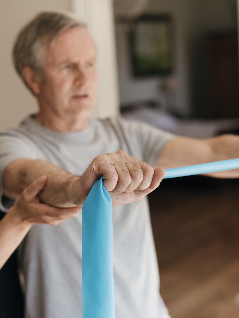 Physiotherapist with client
