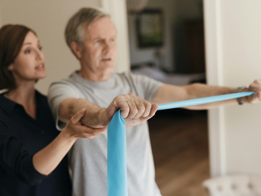 Physiotherapist with client
