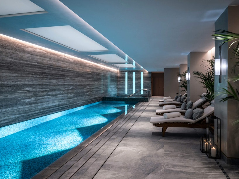 Indoor swimming pool with loungers