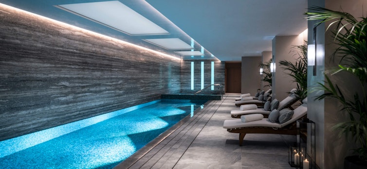 Indoor swimming pool with loungers