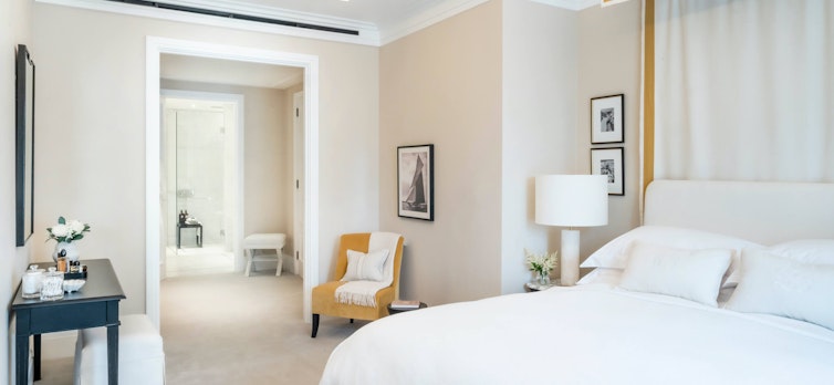 Apartment 203 - Primary Bedroom with canopy bed