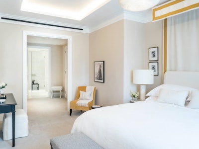 Apartment 203 - Primary Bedroom with canopy bed