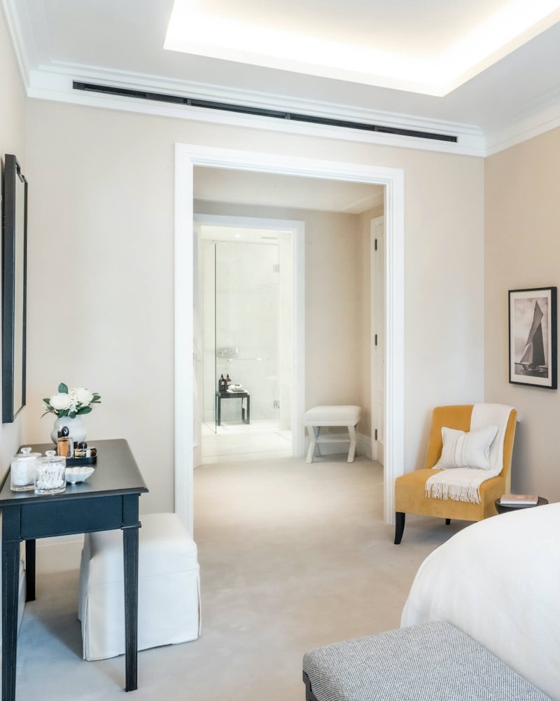 Apartment 203 - Primary Bedroom with canopy bed