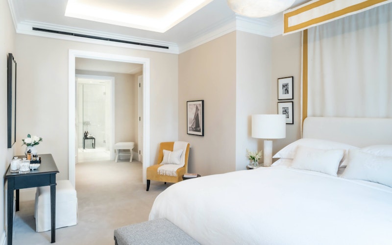 Apartment 203 - Primary Bedroom with canopy bed