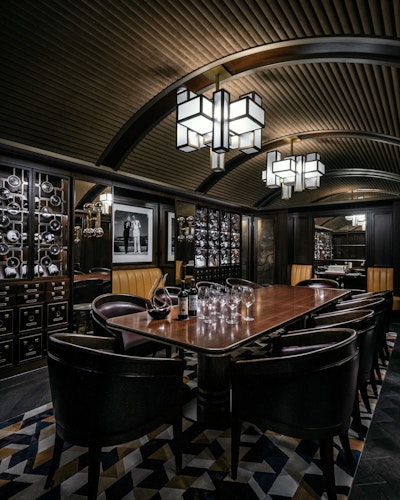Wine Room with cabinets full of wine bottles