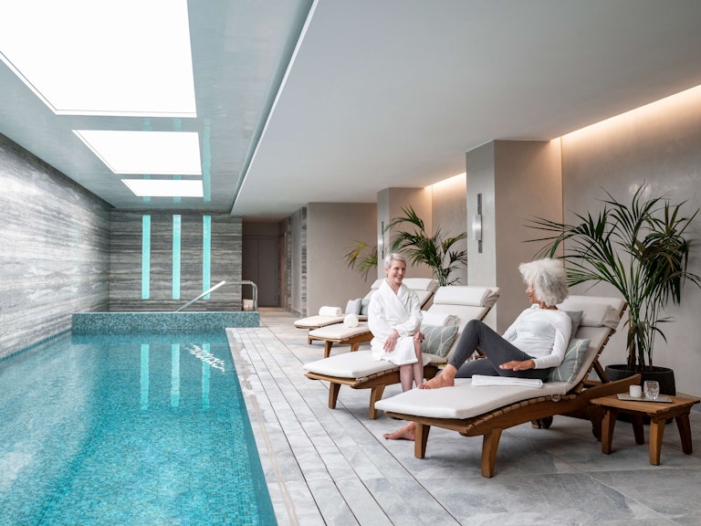 Relaxing by the swimming pool