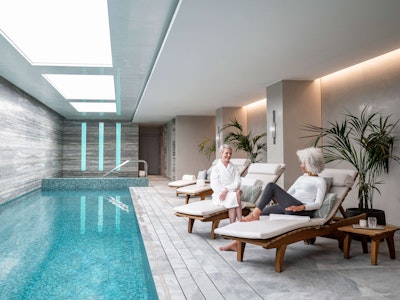 Relaxing by the swimming pool
