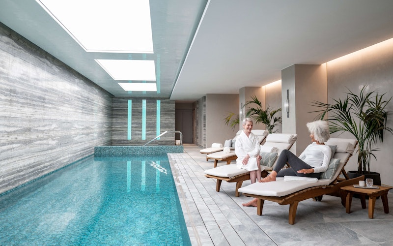 Relaxing by the swimming pool