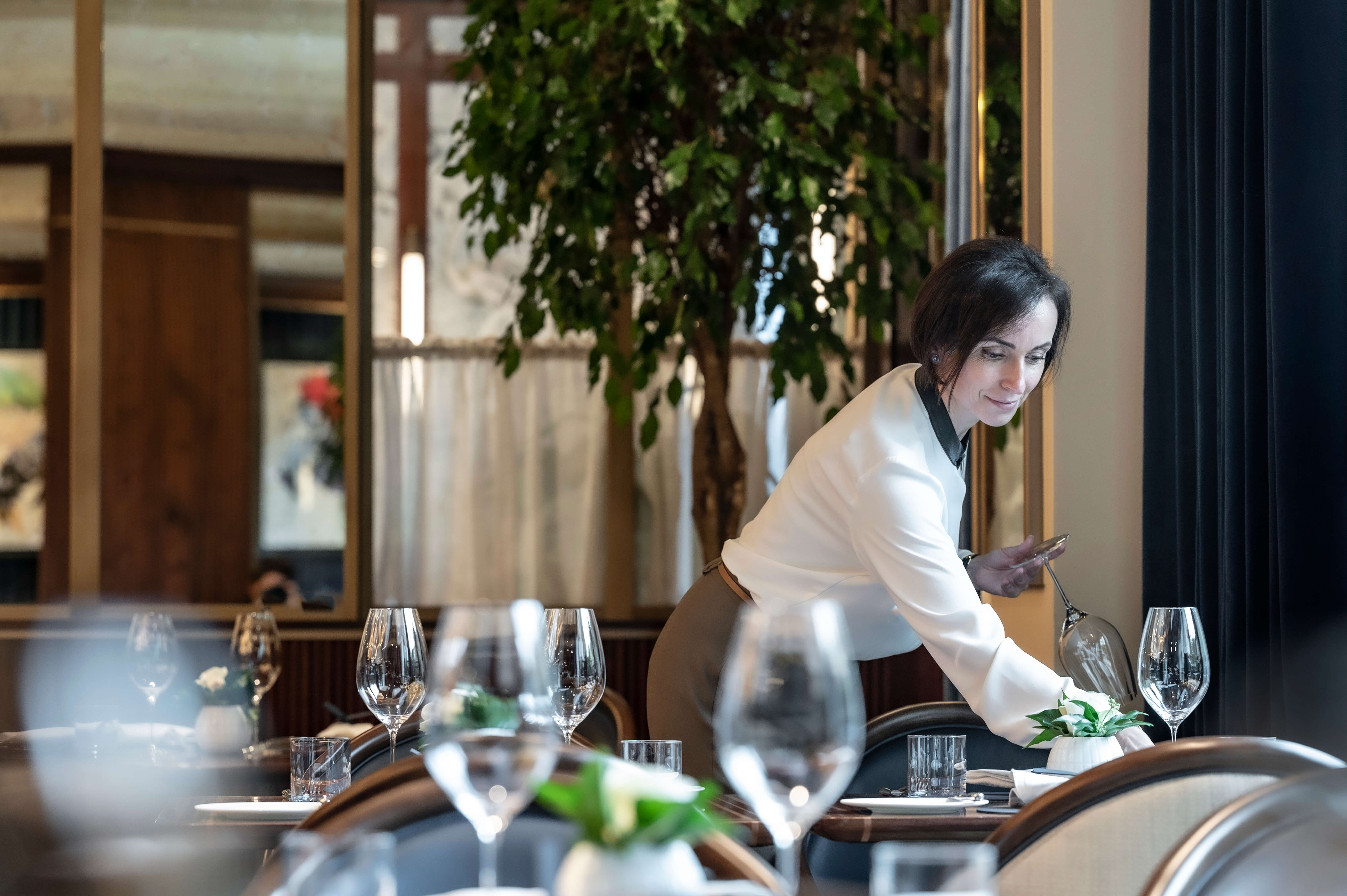 Laying the table in Culford's restaurant