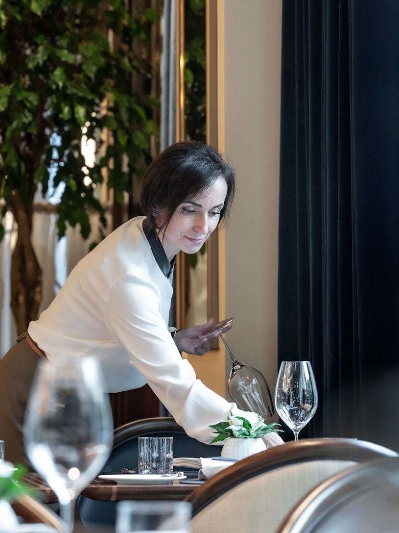 Laying the table in Culford's restaurant