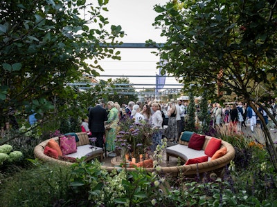 Guests mingling at Chelsea Flower Show