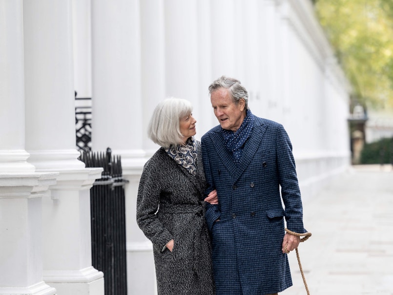Couple walking a dog in Chelsea