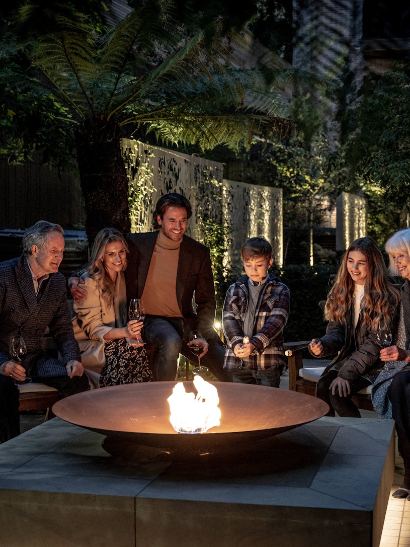 Toasting marshmallows around the firepit