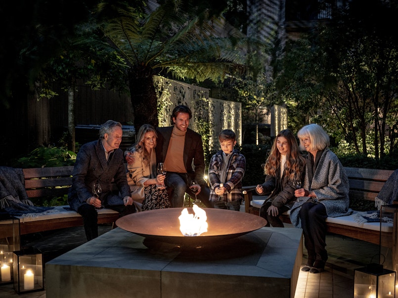 Toasting marshmallows around the firepit