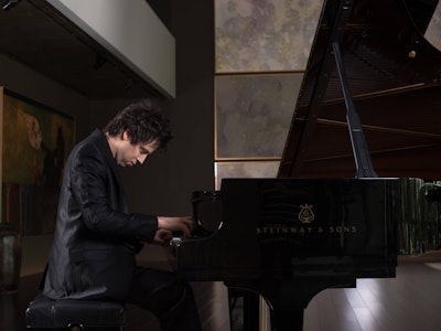 Pianist Dominic Ferris playing a Steinway piano