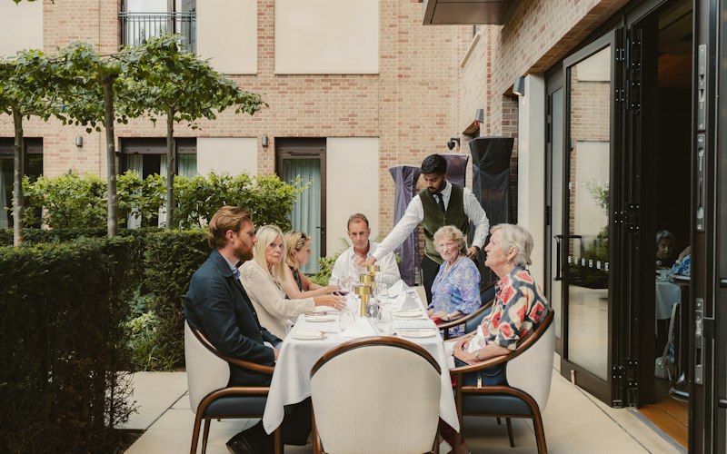 Family dining outside Auriens restaurant