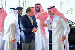 Crown Prince Mohammed bin Salman receiving Egypt's President Abdel Fattah Al-Sisi at the NEOM site, Saudi Arabia, on Aug. 14, 2018. (Photo via Getty Images)