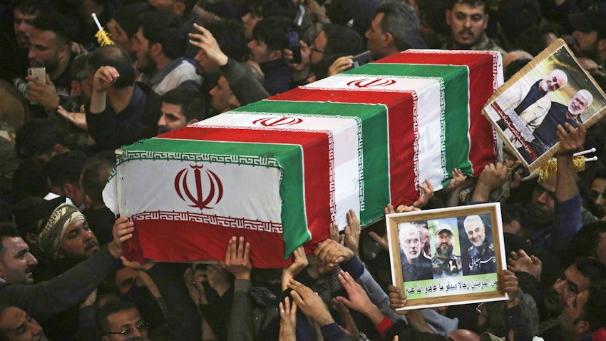 Mourners carry the coffin of slain Iranian military commander Qasem Soleimani, Karbala, Iraq, on Jan. 4, 2020. (Photo via Getty Images)