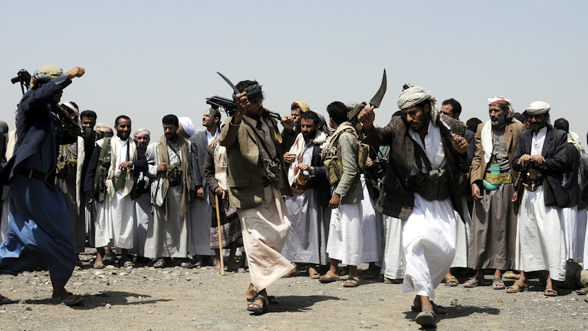 Fighters dance during a protest held to support unities of Houthi Ansarullah Movement in Sanaa, Yemen on Aug. 11, 2016. (Photo by Mohammed Hamoud/Anadolu Agency/Getty Images)