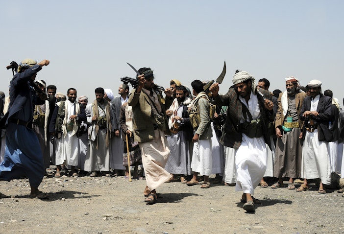 Fighters dance during a protest held to support unities of Houthi Ansarullah Movement in Sanaa, Yemen on Aug. 11, 2016. (Photo by Mohammed Hamoud/Anadolu Agency/Getty Images)