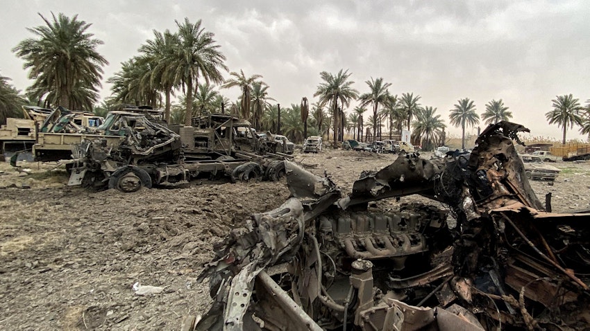 Damaged military vehicles in the aftermath of US airstrikes in the Jurf al-Sakher area in Iraq. March 13, 2020. (Photo via Getty Images)