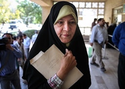 Faezeh Hashemi, daughter of two-time president Akbar Hashemi Rafsanjani, before her trial. Tehran, Iran,  Aug. 7, 2013. (Photo by Sina Shiri via Fars News Agency)